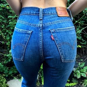 Distressed Medium Wash Levi’s Wedgie Skinny Jeans